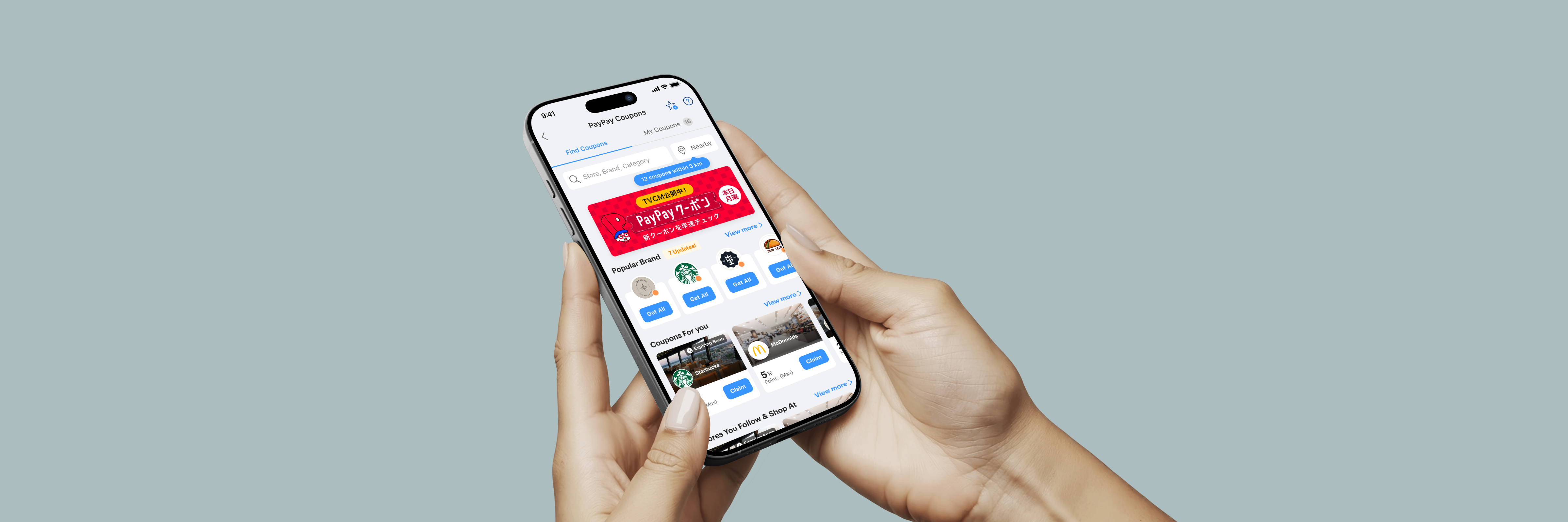 Hands hold a phone showing the redesigned PayPay Coupons discovery experience.
